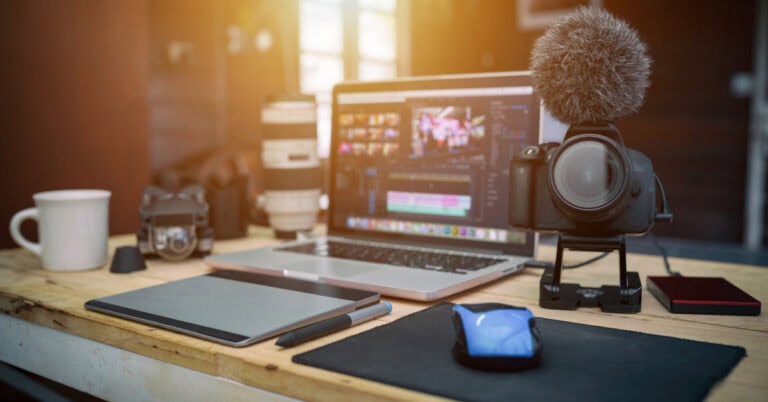 laptop and recording equipment on desk- how to monetize with youtube affiliate marketing